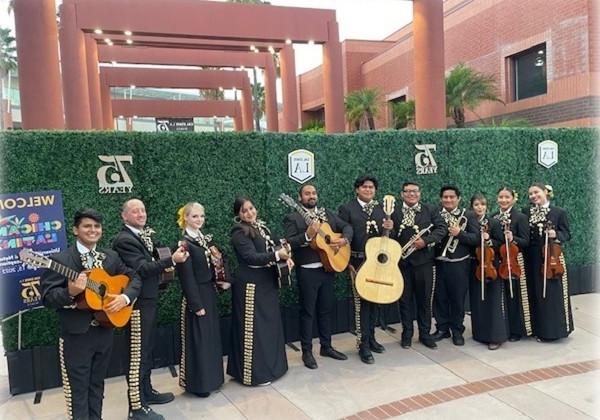 The Mariachi Ensemble posing in front the Luckman Theater.